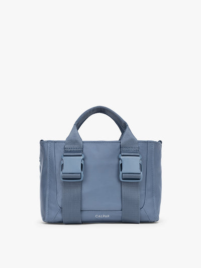 CALPAK Fit Gym Crossbody Bag in blue Indigo front view with white background; ABF2601-INDIGO view 1