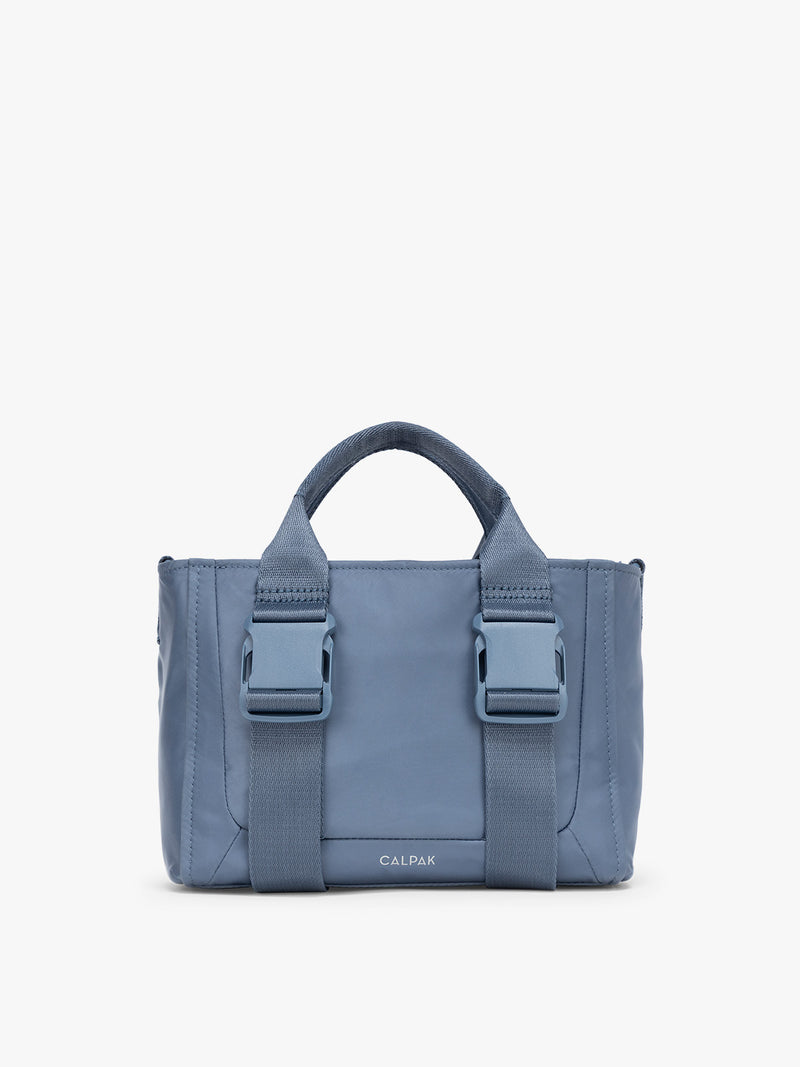 CALPAK Fit Gym Crossbody Bag in blue Indigo front view with white background