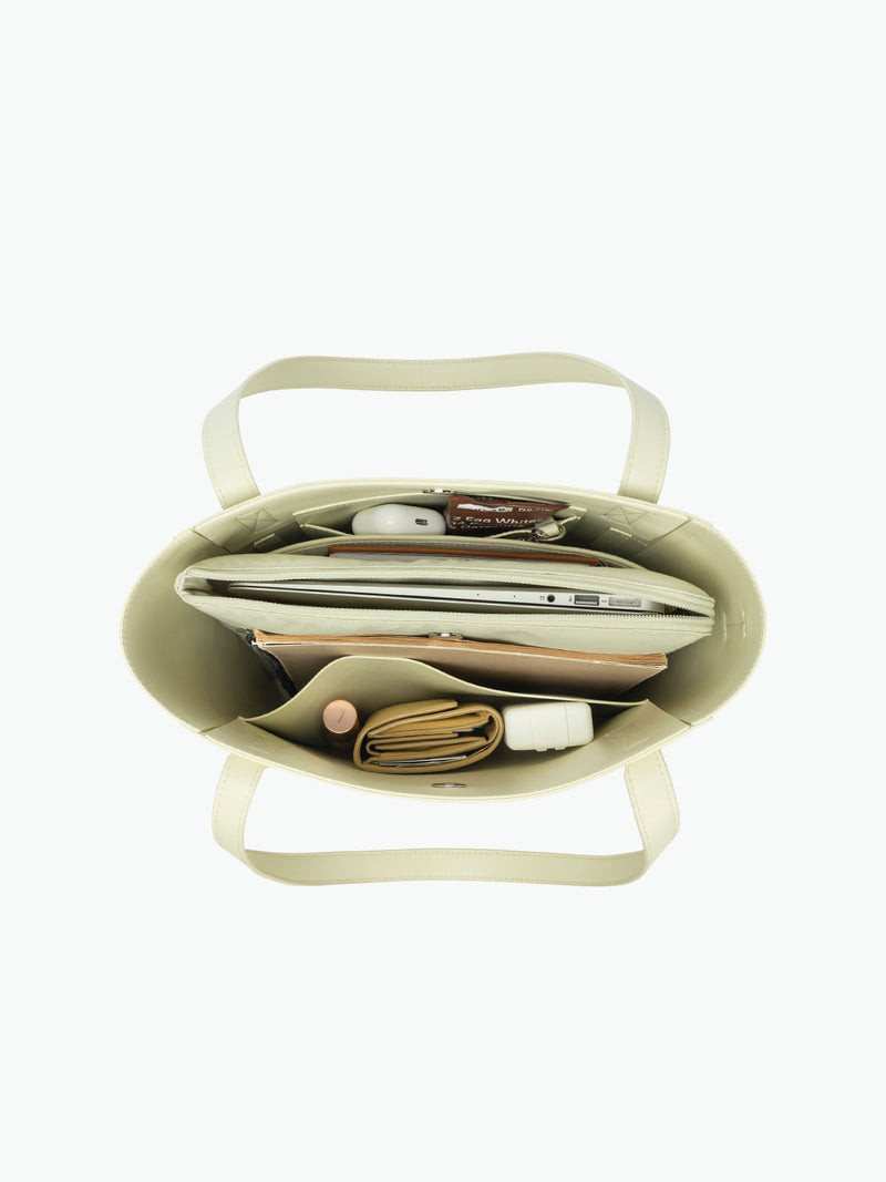 Open interior of the CALPAK Haven 14" Haven Laptop Tote in light green Celadon
