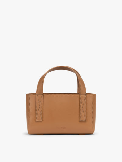 CALPAK Haven Mini Crossbody Bag in brown Toffee front view; AMC2501-TOFFEE view 1
