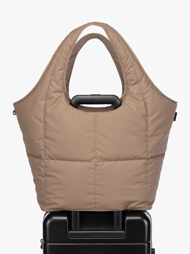 Luggage Trolley sleeve of CALPAK Luka Everything Tote in brown Chocolate