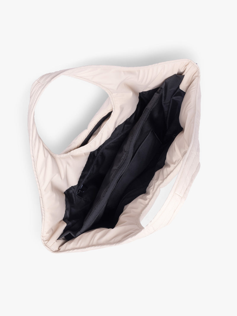 Opened CALPAK Luka Everything Tote in off-white beige Oatmeal