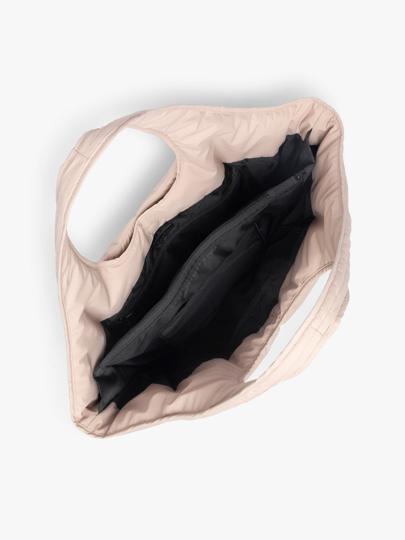 Opened CALPAK Luka Everything Tote in light pink Rose Quartz
