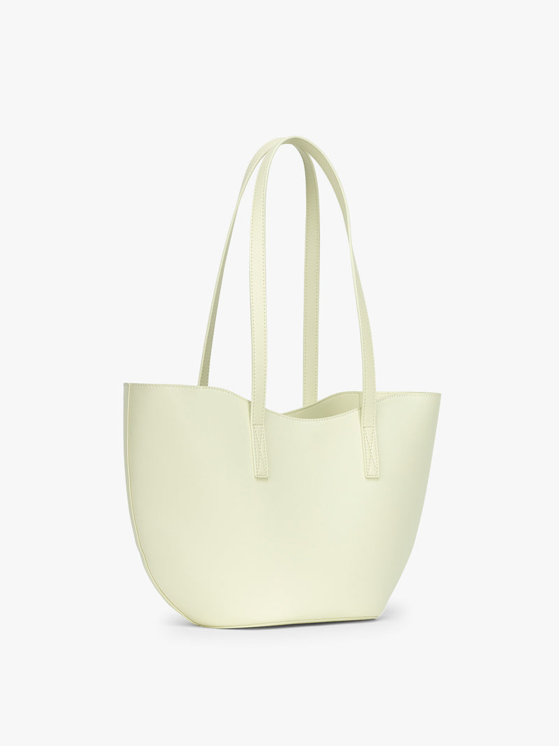 Side view of CALPAK Haven Tulip Tote in light green Celadon