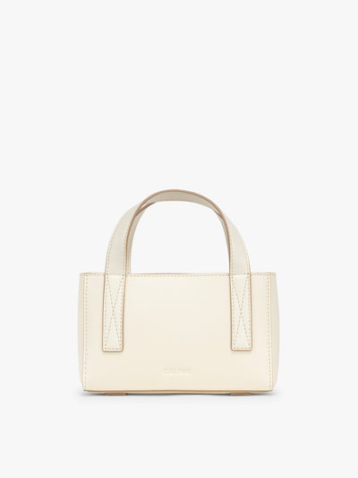 CALPAK Haven Mini Crossbody Bag in beige Buttercream; AMC2501-BUTTERCREAM view 1