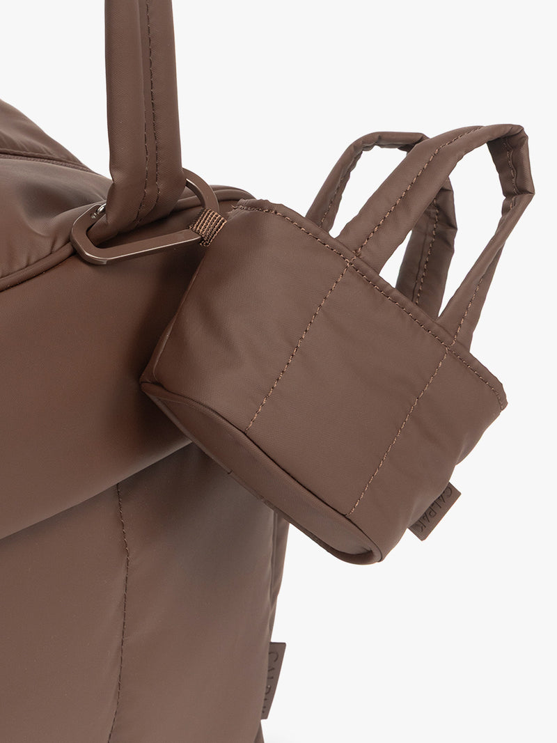 CALPAK Luka Tote Zip Bag Charm in brown Walnut with carabiner attached