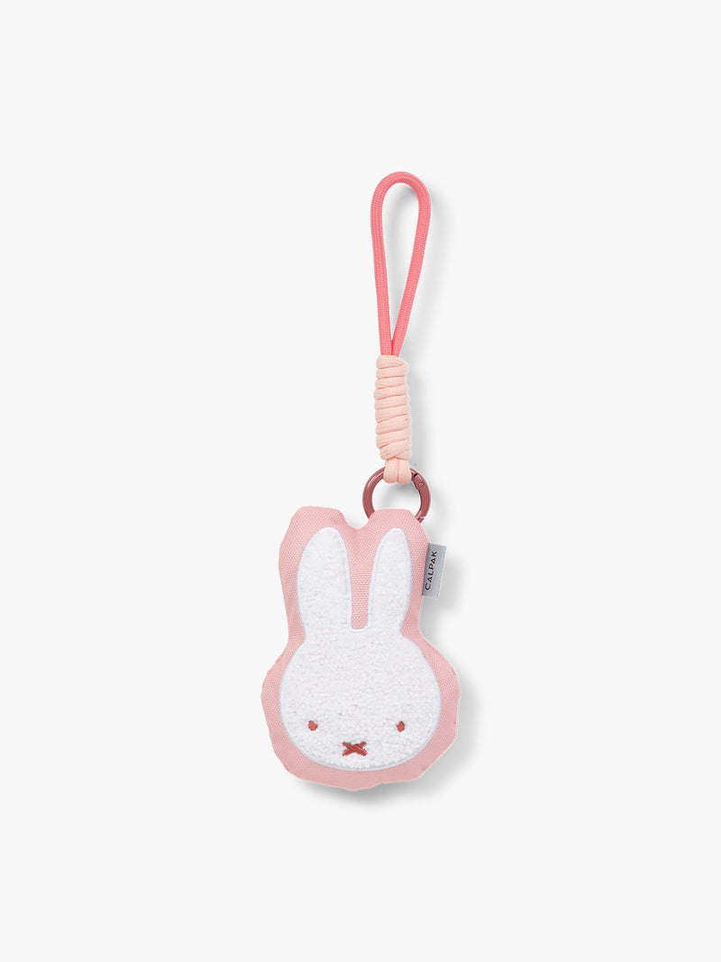 Plush Miffy x CALPAK Pluffy Bag Charm keychain with a pink border and Miffy on a white background