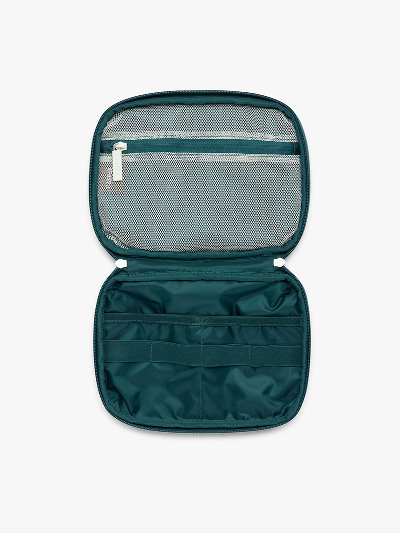 Opened view of CALPAK Tech Organizer in multicolor stripes