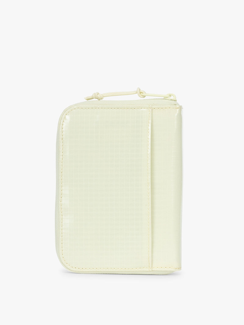 Backside of Front side of CALPAK Terra Zip Passport Wallet in light green Celadon