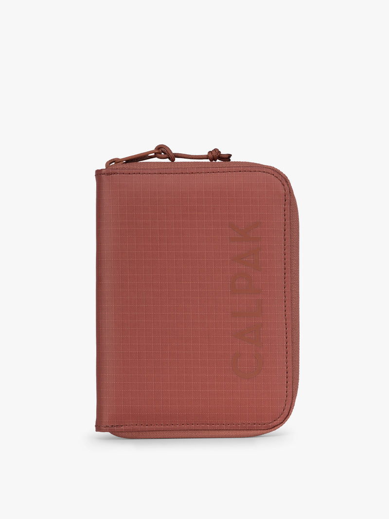 CALPAK Terra Zip Passport Wallet in red-orange Clay