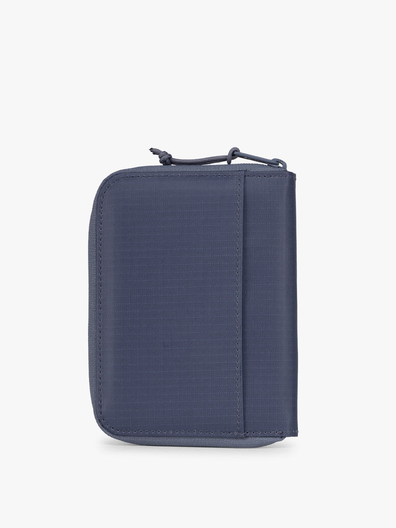 CALPAK Terra Zip Passport Wallet in blue Indigo back