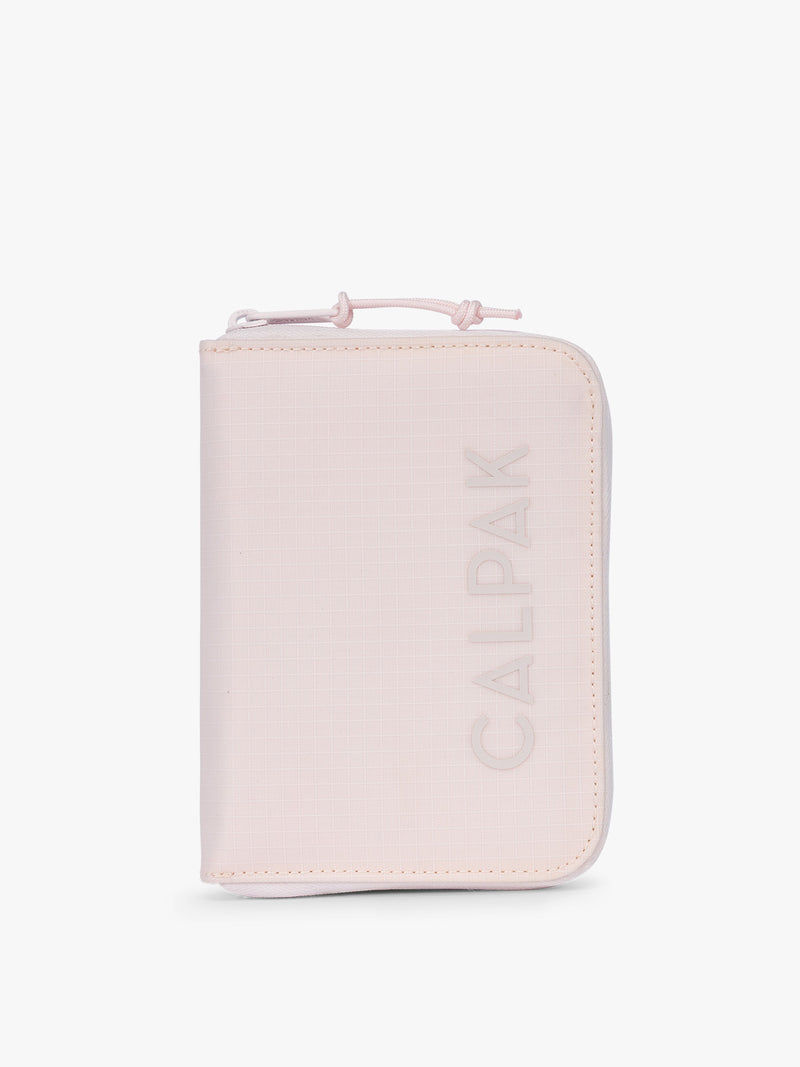 CALPAK Terra Zip Passport Wallet in light pink Shell Pink