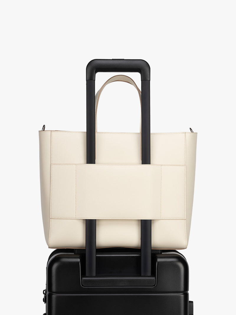 Trolley sleeve of CALPAK Haven 15" Laptop Tote in beige Buttercream
