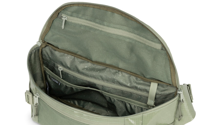 Interior view of CALPAK Terra Sling Bag in Juniper