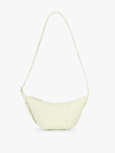 CALPAK Luka Crescent Tote bag in light green Celadon with shoulder strap and bag is expandable up to 2 on a white background; CBL2601-CELADON view 1