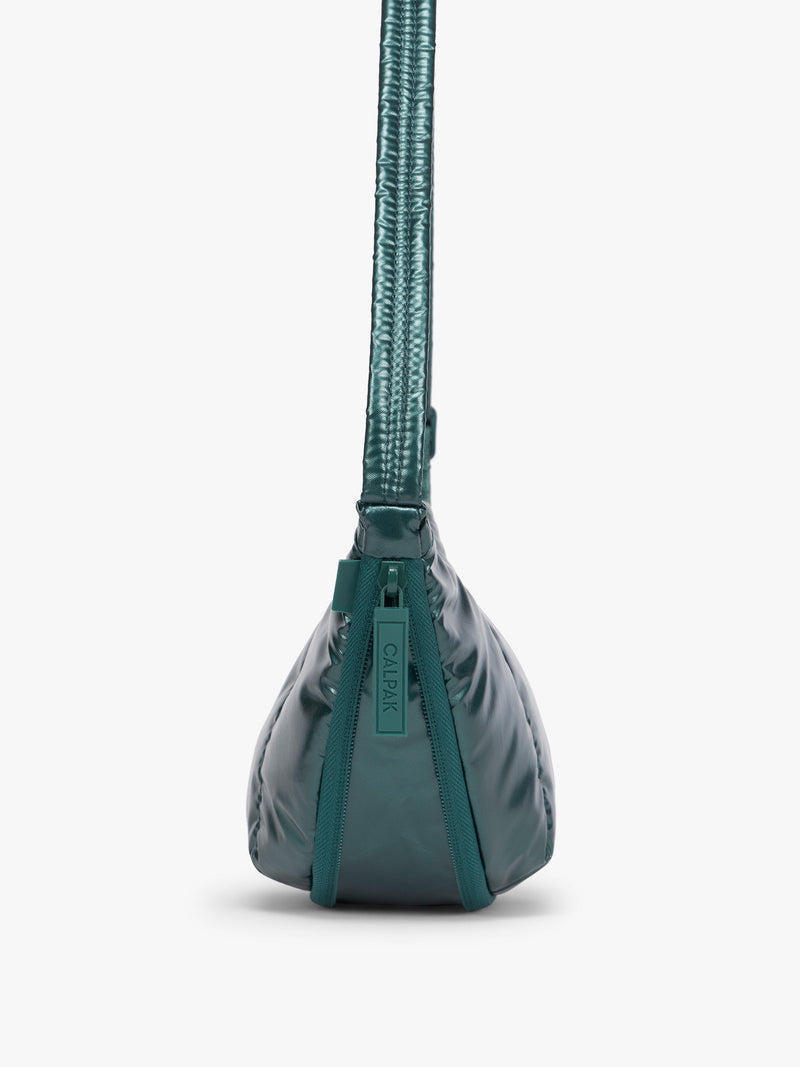 Size expandable zipper of CALPAK Luka Crescent Bag in dark green shiny Kale