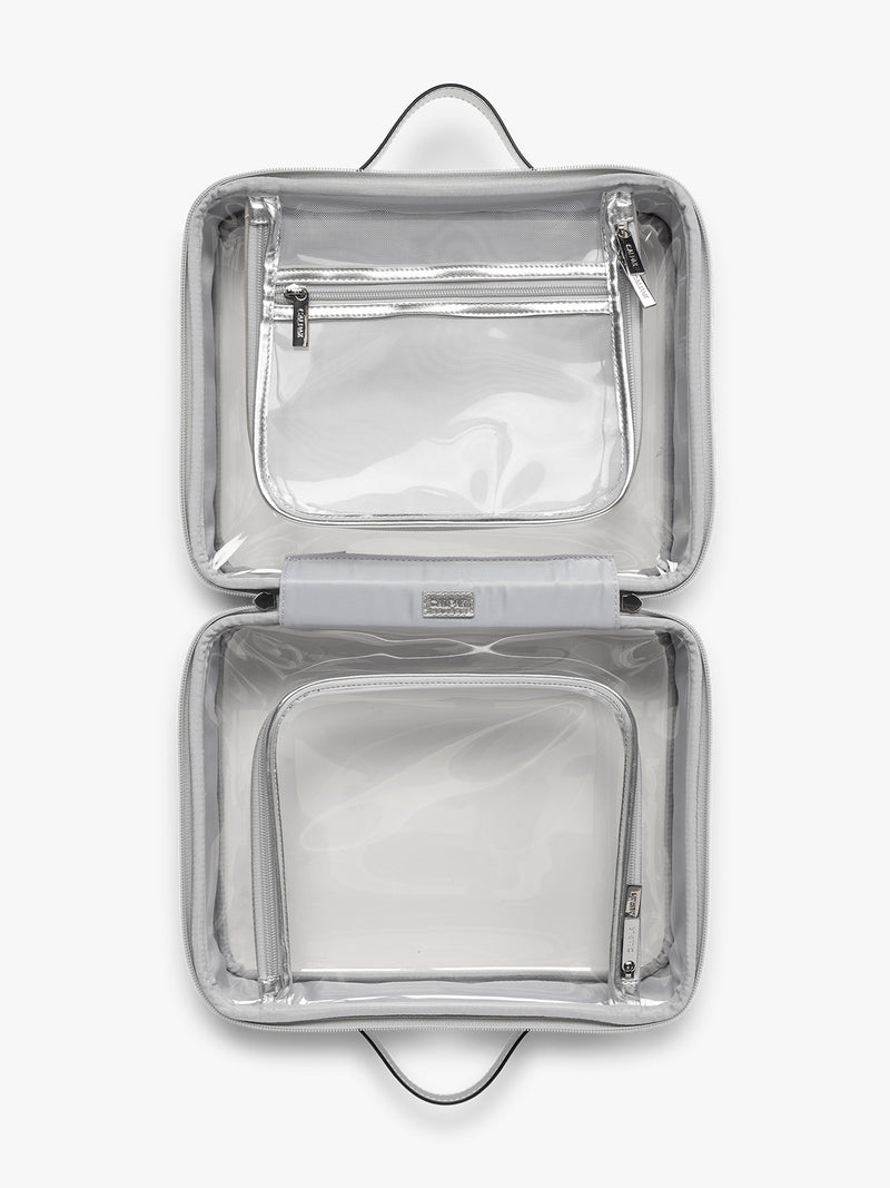 Opened view of CALPAK Large Clear Cosmetics Case in Silver