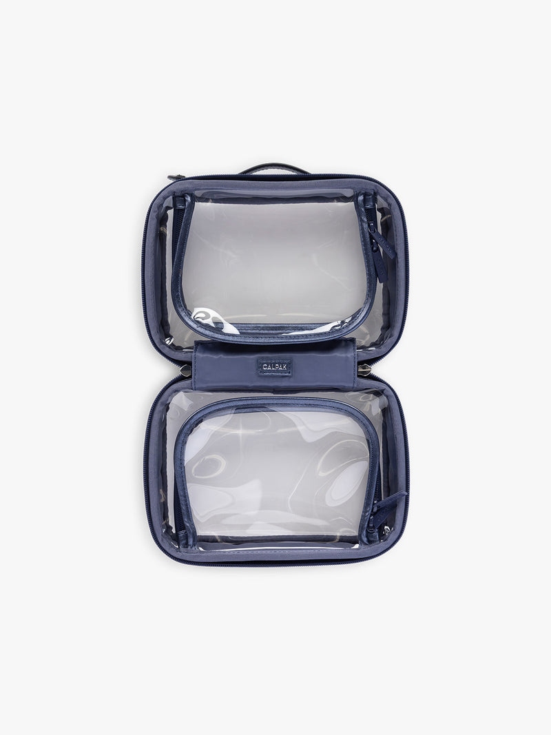Opened view of CALPAK Small Clear Cosmetic Case in dark blue Metallic Indigo with white and dark blue gingham interior