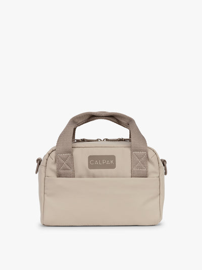 CALPAK Connect Crossbody Bag in beige Greige with a visible brand logo on a white background; CCN2501-GREIGE view 1