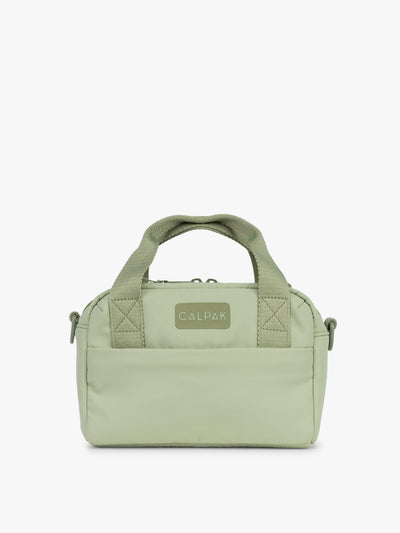 CALPAK Connect Crossbody Bag in light green Meadow with a visible brand logo on a white background; CCN2501-MEADOW view 1