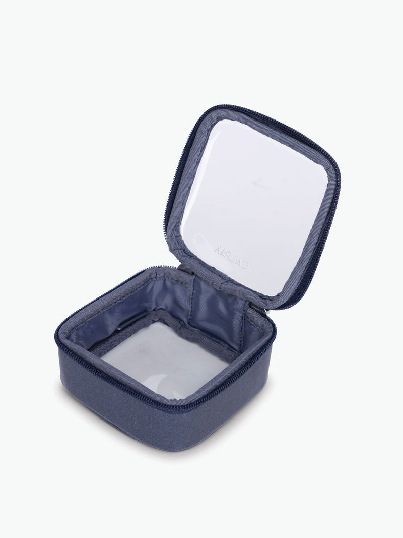 Opened view of CALPAK Clear Cosmetic Case in dark blue Metallic Indigo