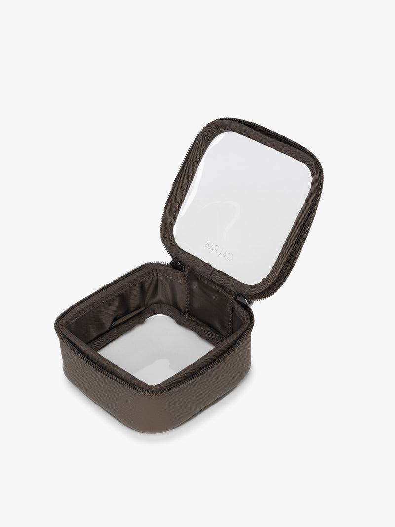 Opened CALPAK Tiny Clear Cosmetic Case in brown Mushroom