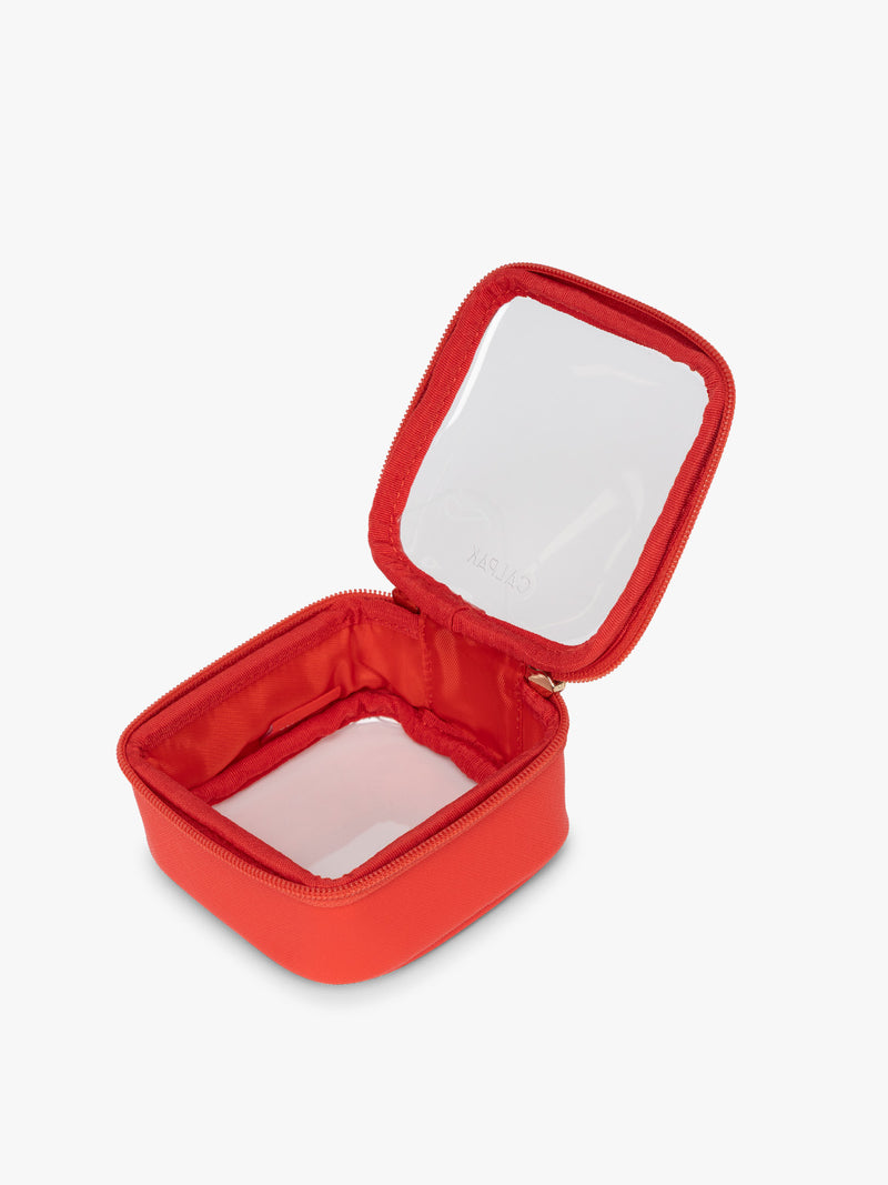 Opened CALPAK Tiny Clear Cosmetic Case in red Tomato