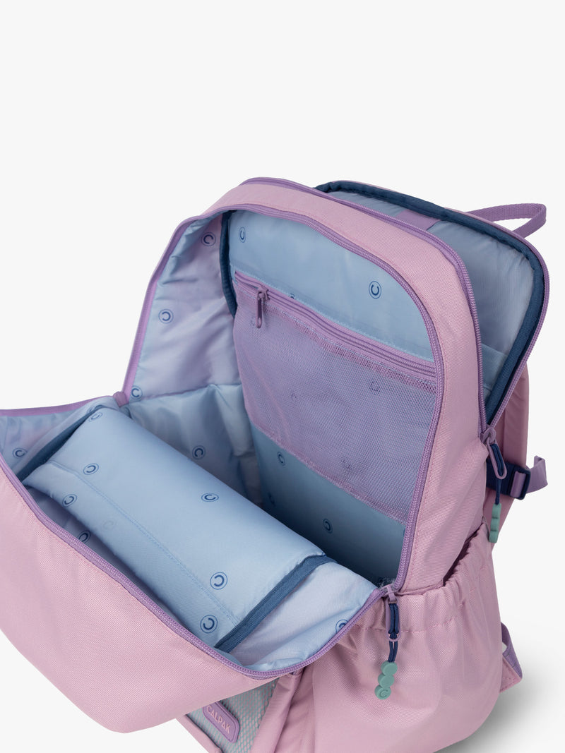 CALPAK Kids Large Backpack in lavender pink Orchid Pink for ages 8-12 opened view with multiple interior pockets and blue lining