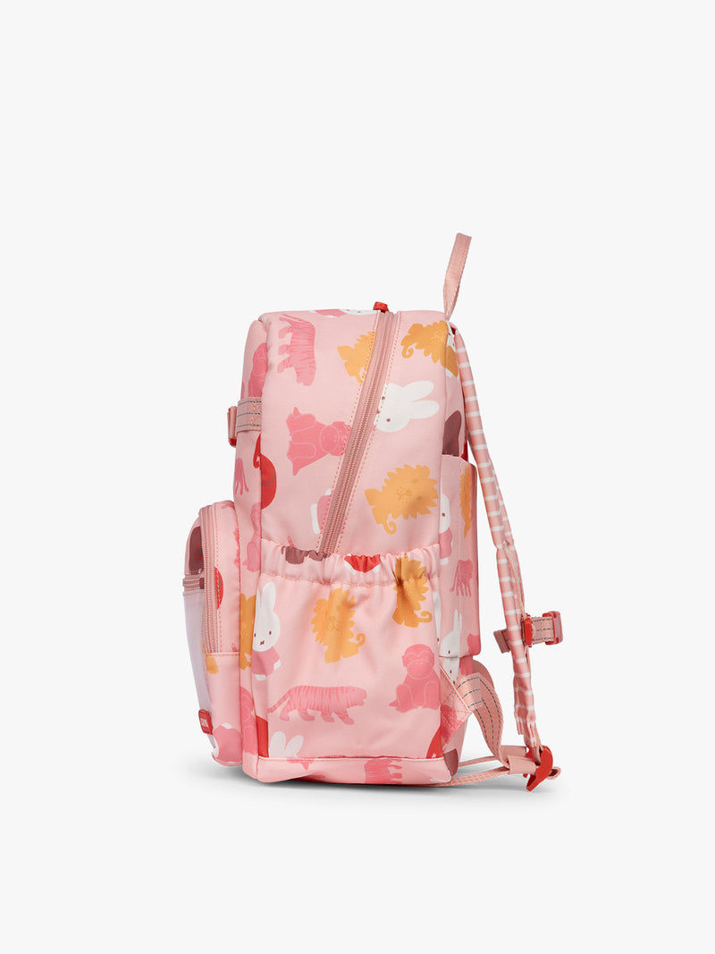 Side view of CALPAK Kids Medium Backpack with Miffy and pink colorful animal pattern on a white background