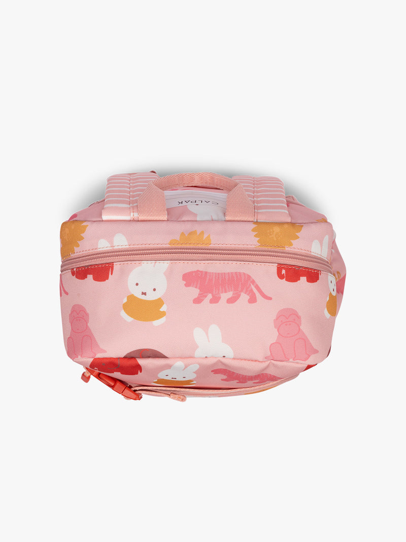 Top view of CALPAK Kids Small Backpack with Miffy and pink colorful animal pattern on a white background