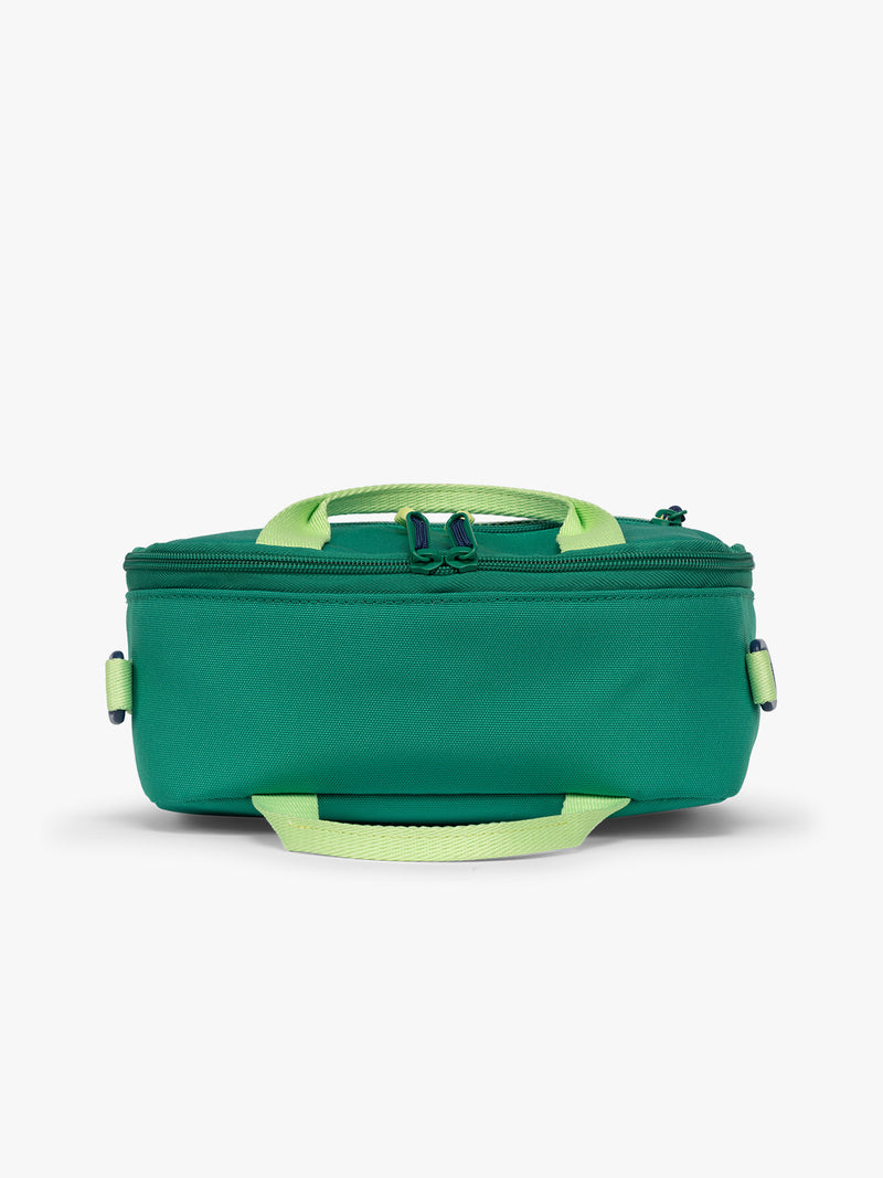 Top view of Green CALPAK Kids Lunch Bag with lime green accents and front mesh pocket on a white background