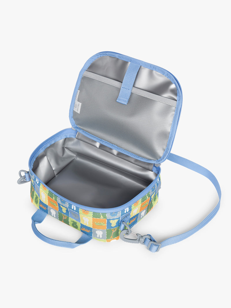Opened view that shows insulated feature of blue CALPAK Kids Lunch Bag with Miffy and animal pattern with mesh front pocket and top handles on a white background