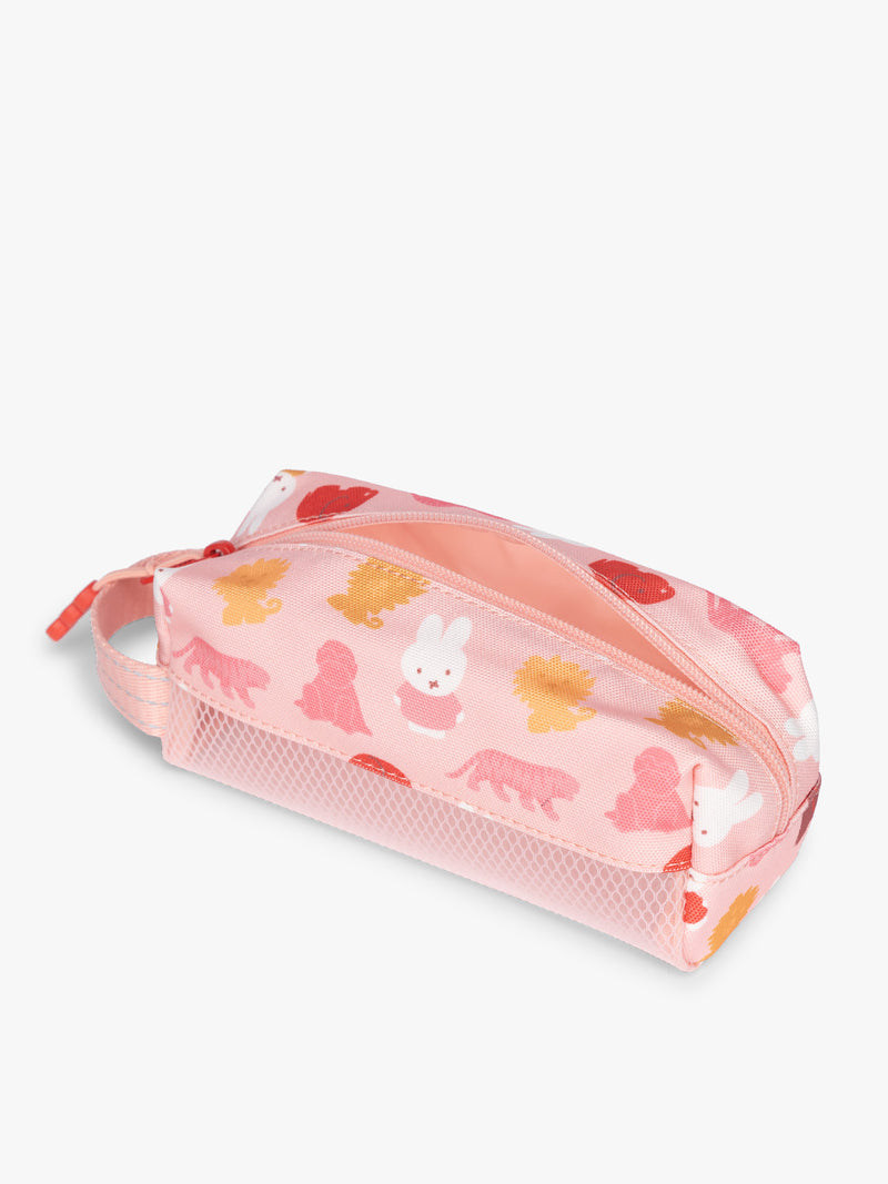 Side view with zipper of colorful CALPAK Kids Pencil Case with Miffy and cartoon designs on a white background in Miffy Pink Zoo Trip