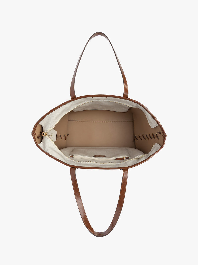 Opened CALPAK Colette 15" Canvas Laptop Tote with zipper and interior pockets in beige canvas material with brown finishing in Natural Brown