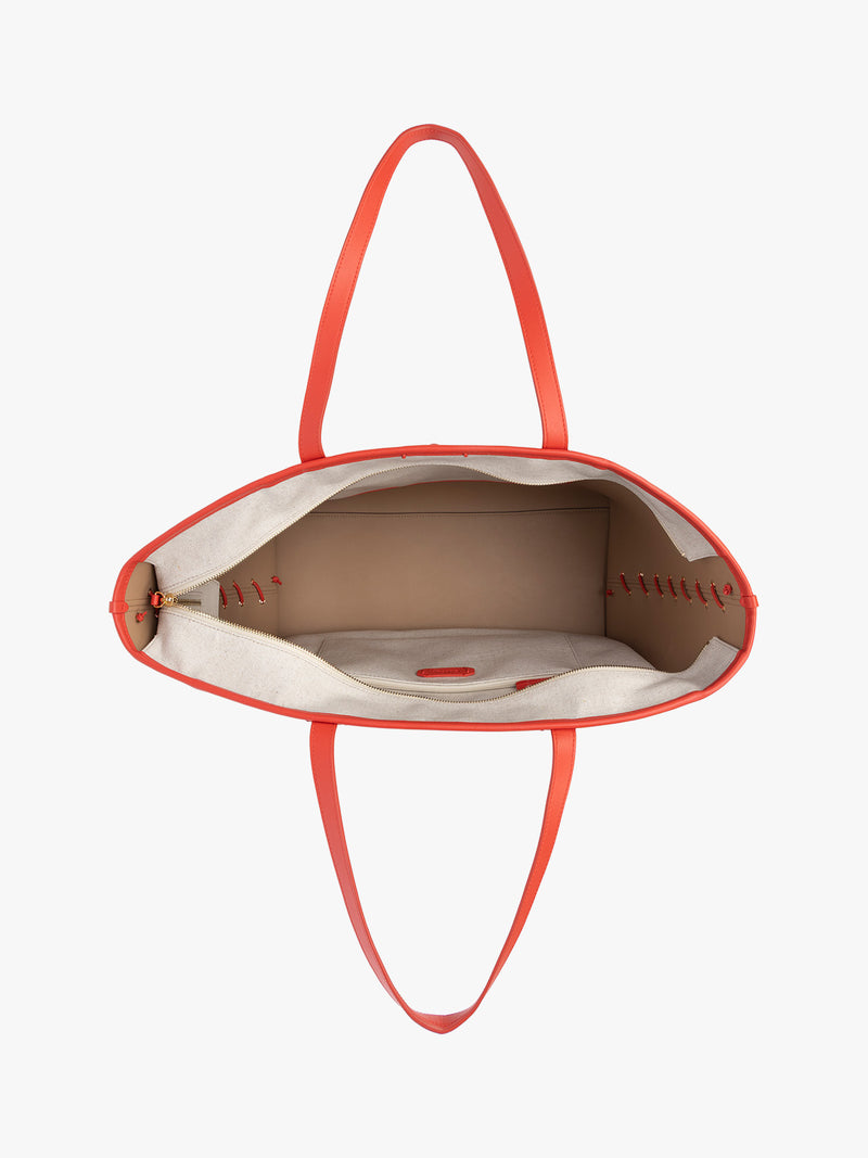 Opened CALPAK Colette 15" Canvas Laptop Tote with zipper and interior pockets in beige canvas material  with red finishing in Natural Tomato