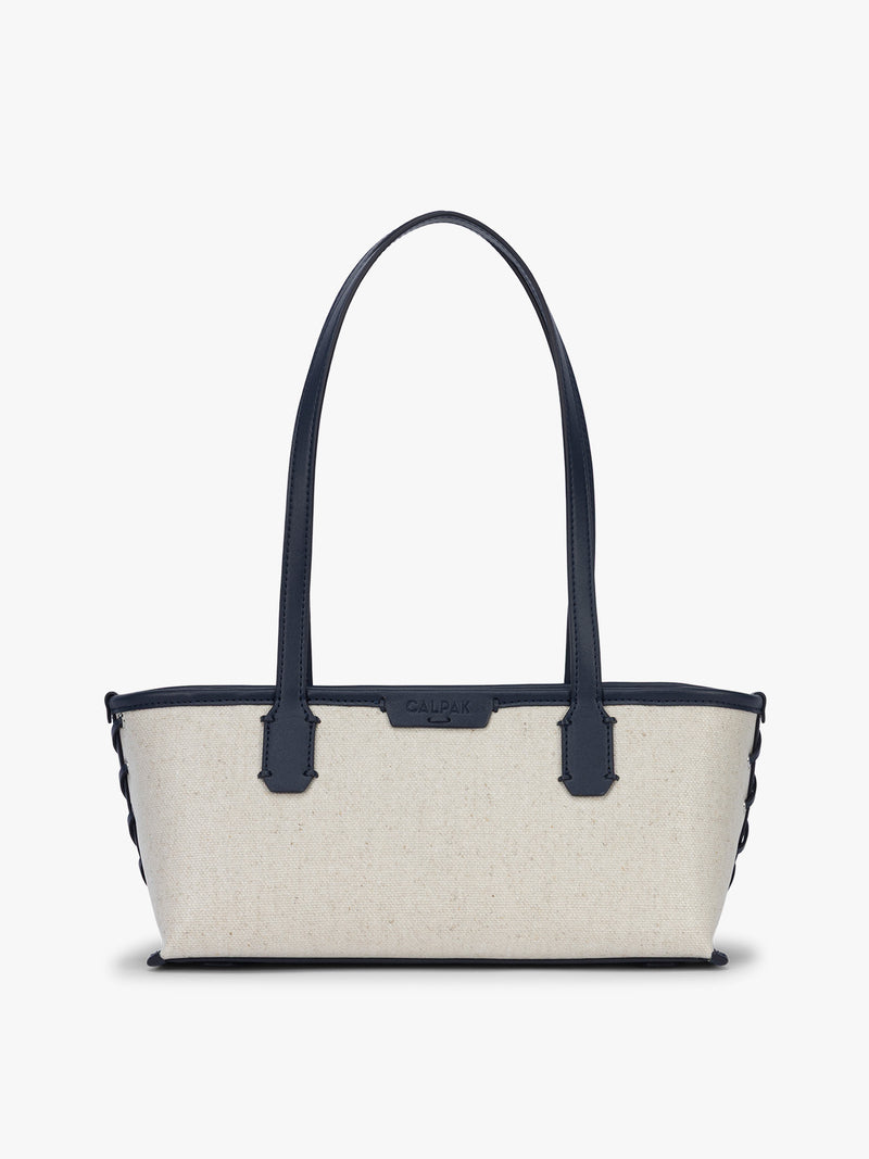 CALPAK Colette Canvas Shoulder Tote in beige canvas material  and blue finishing