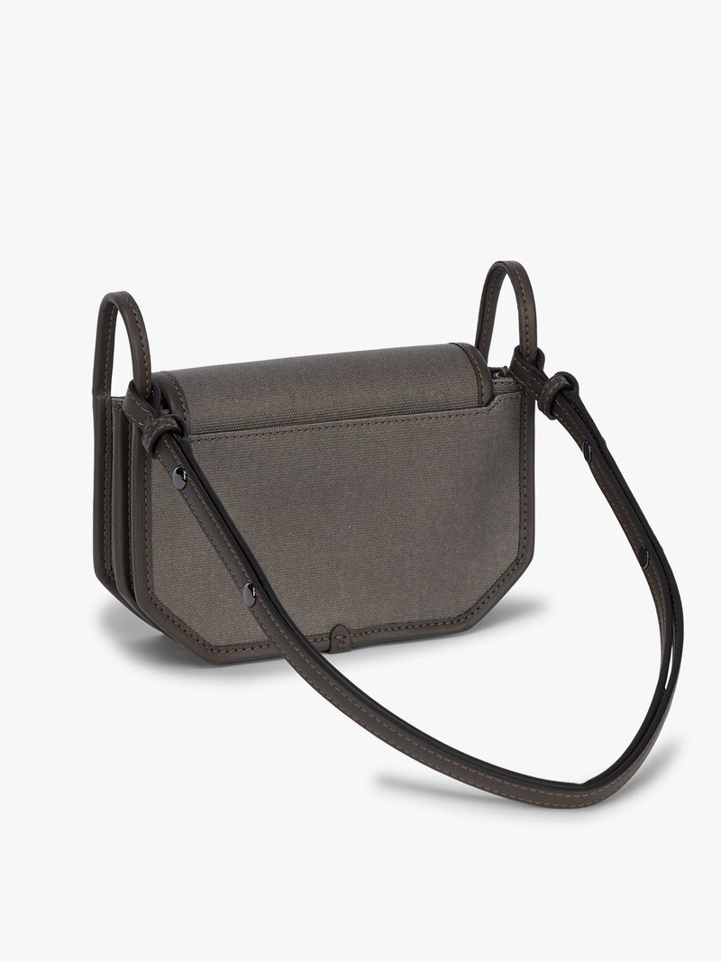 Backside of CALPAK Colette Canvas Crossbody Wallet Bag in brown canvas material