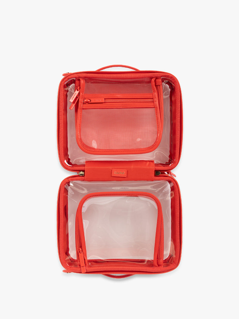 Opened view of CALPAK Medium Clear Cosmetic Case in red Tomato