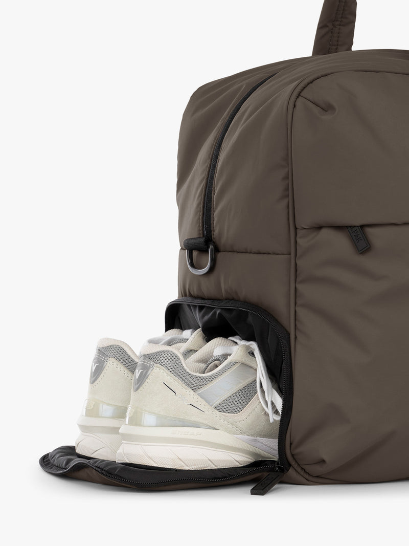 Shoe compartment of CALPAK Luka Large Duffel in brown Mushroom