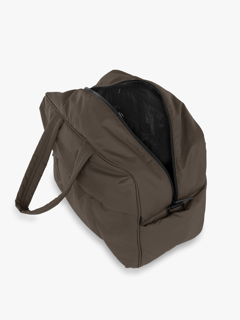 Opened CALPAK Luka Large Duffel in brown Mushroom