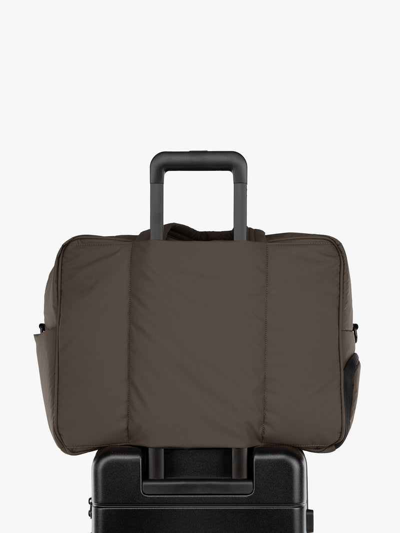 Trolley Sleeve of CALPAK Luka Large Duffel in brown Mushroom
