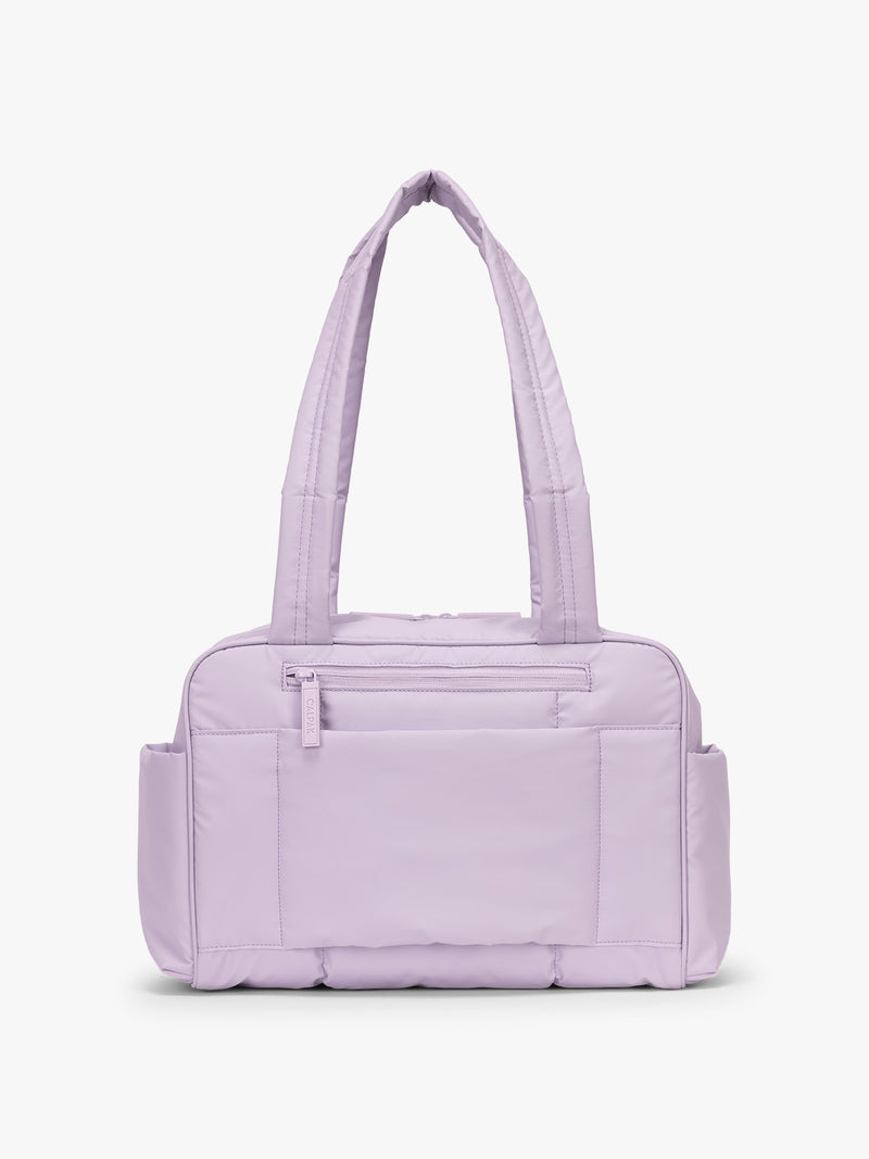Back side of CALPAK Luka Mini Duffel in light purple Orchid on a white background