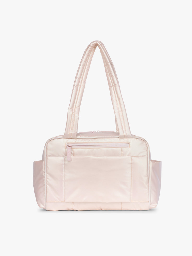 Backside of CALPAK Luka Mini Duffel in light pink shiny Pearlescent