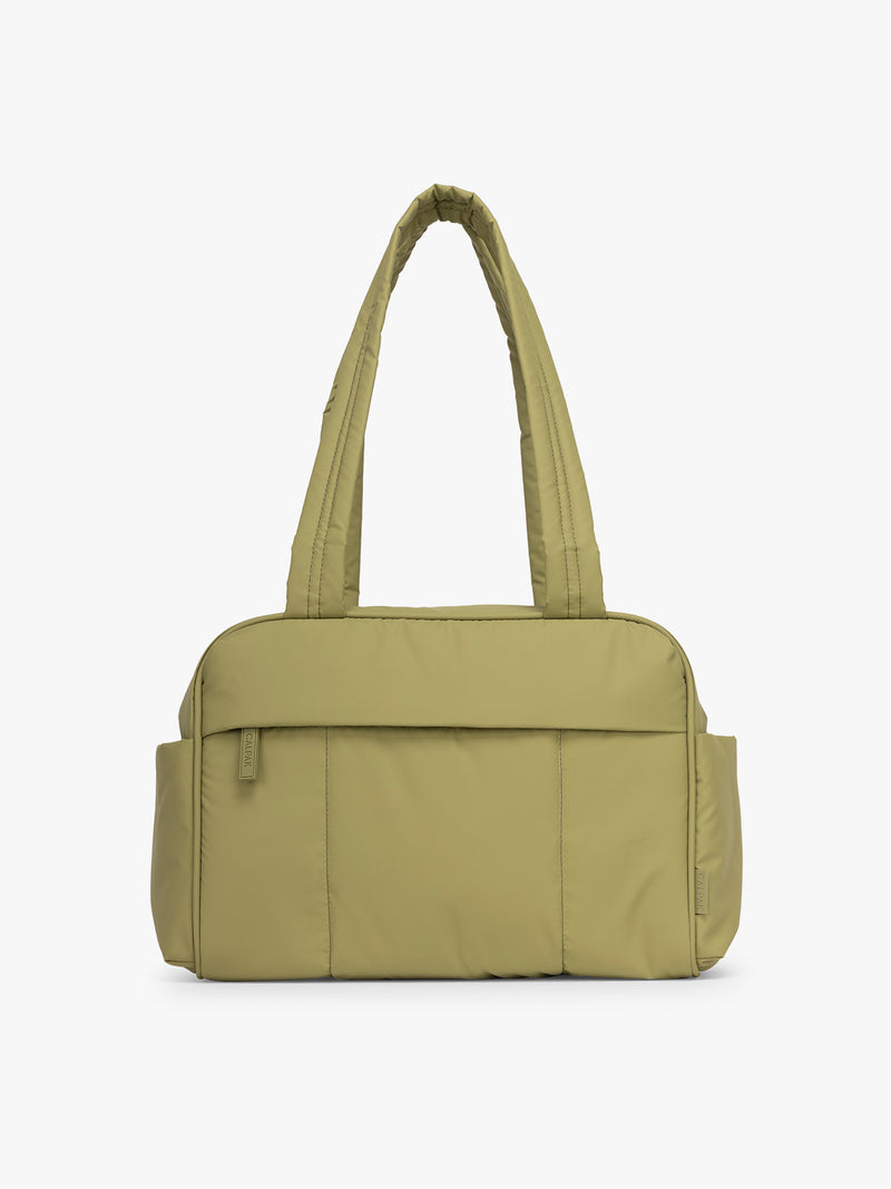 CALPAK Luka Mini Duffel in dark green Pistachio on a white background