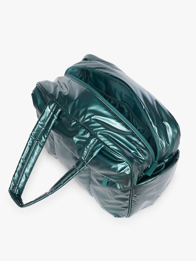 Opened CALPAK  Luka Duffel in dark green shiny Glazed Kale