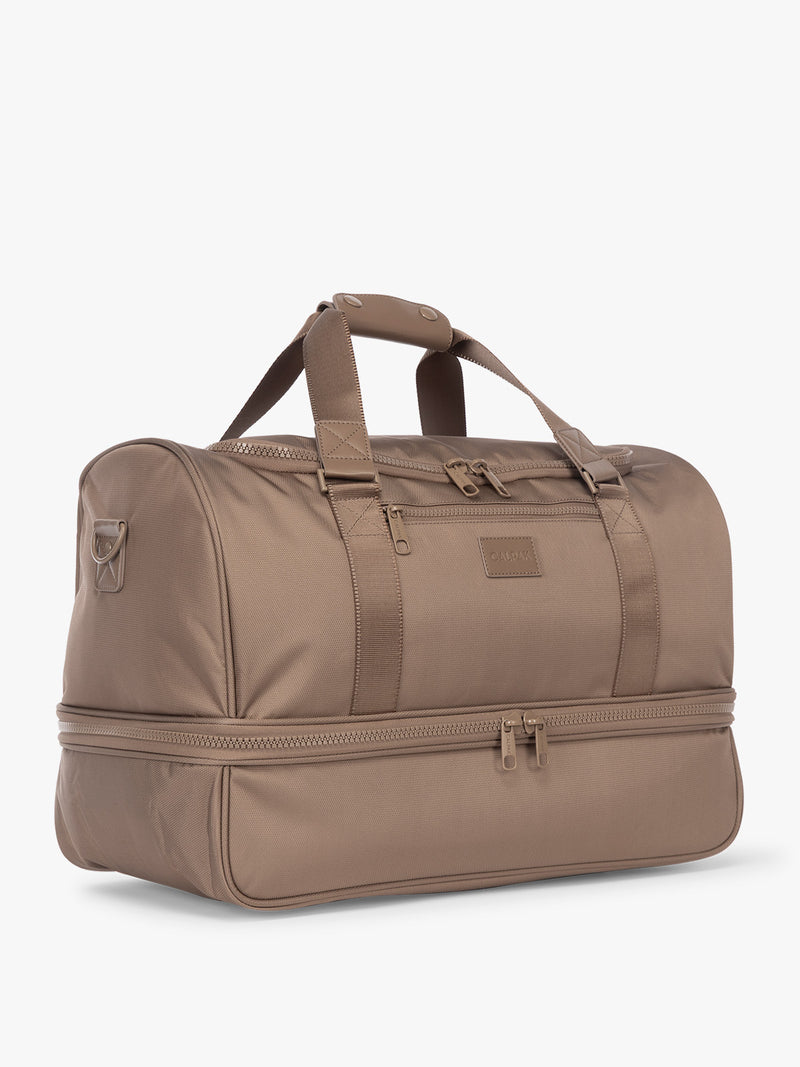 Side view of CALPAK Stevyn Duffel with Shoe Compartment in brown Chocolate