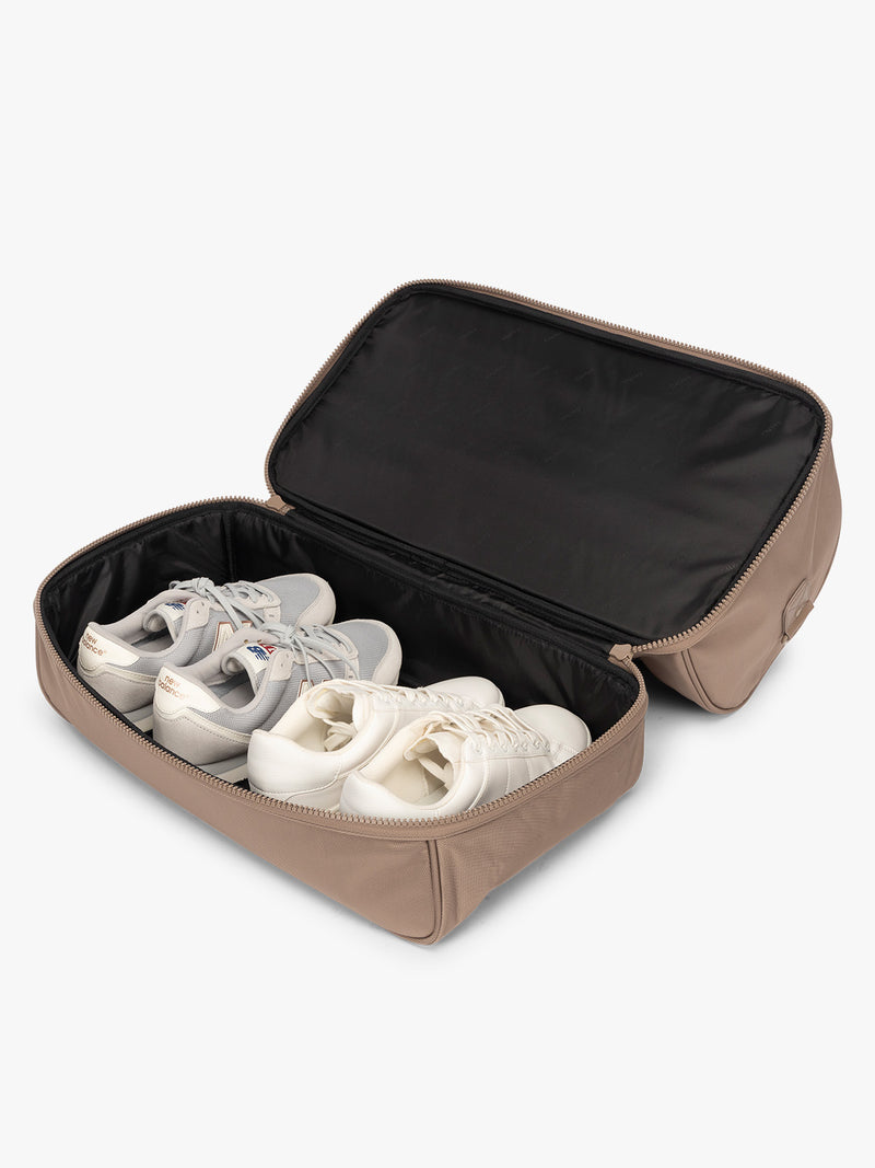 Shoe compartment of CALPAK Stevyn Duffel with Shoe Compartment in brown Chocolate