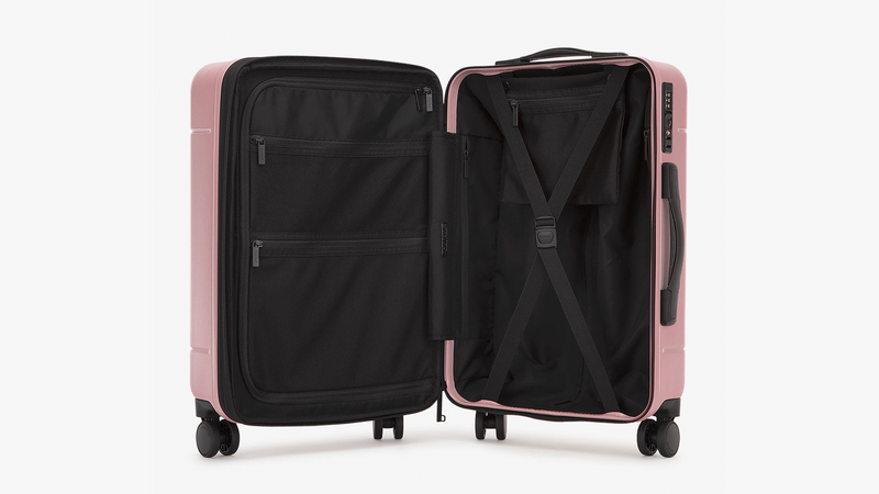 CALPAK Hue Large Luggage in pink Mauve opened showing the capacity