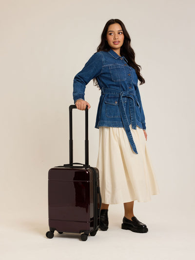 CALPAK Hue Carry On Luggage in Dark Cherry Red on white background; LHU1020-NP-GLAZED-DARK-CHERRY view 2