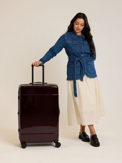 CALPAK maroon Hue Large Luggage in Glazed Dark Cherry; LHU1028-GLAZED-DARK-CHERRY view 2